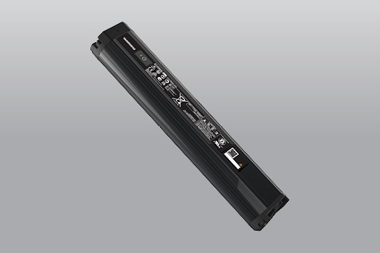 Rechargeable laptop battery on a grey background