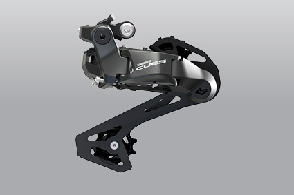 Shimano Deore XT Di2 RD-M8050-GS rear derailleur on gray background