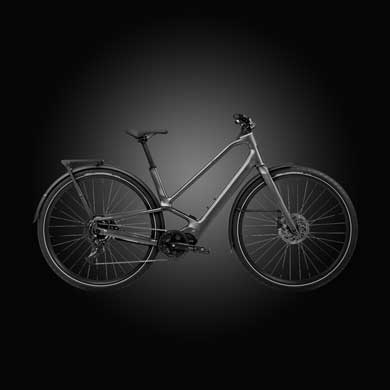 Sleek black bicycle with modern design and two large wheels on a dark background