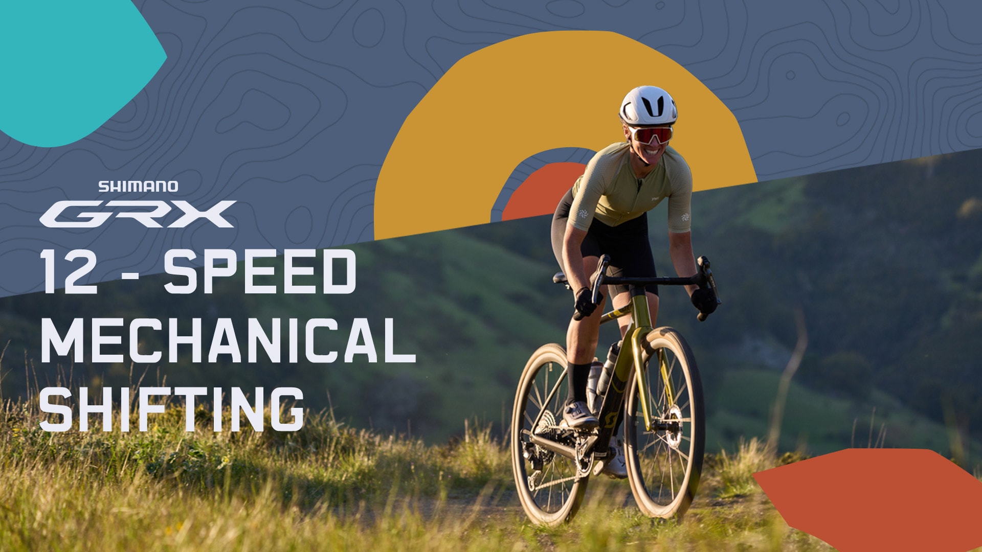Kaksi pyöräilijää ajaa hiekkapolulla, tekstissä lukee GRX Di2 12-Speed ja Shimano-logo
