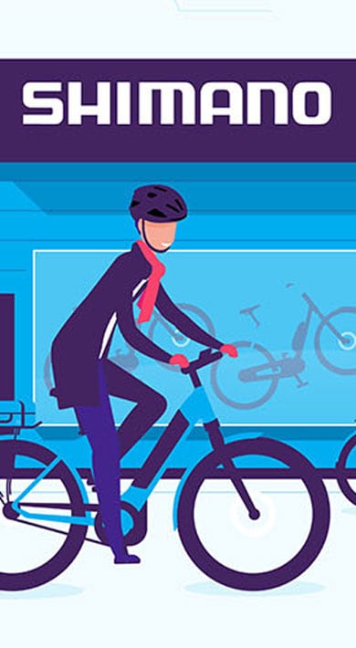 Illustration of a person riding a bicycle in front of a Shimano store