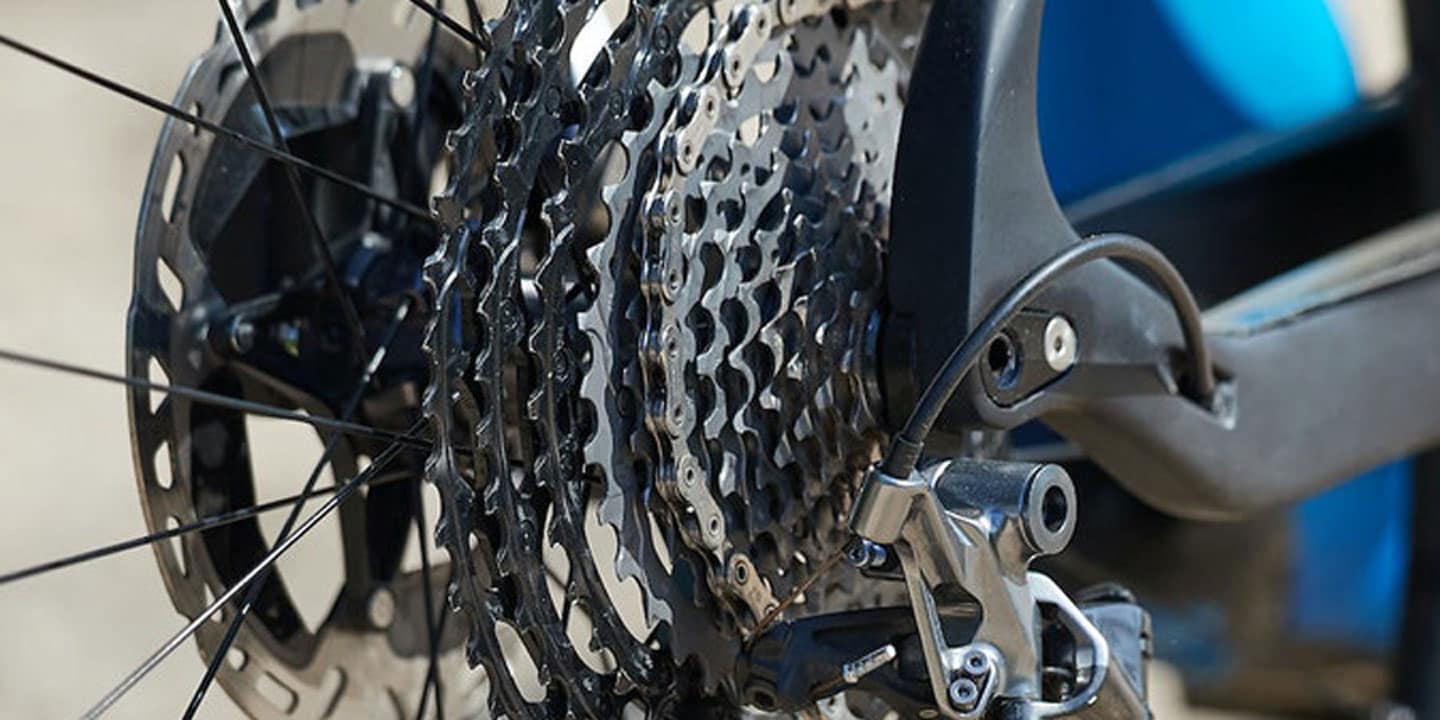 Close-up of a mountain bike's rear cassette and derailleur system