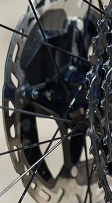 Close-up of a mountain bike's rear cassette and derailleur system