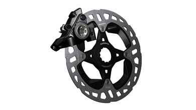 Rotor y pinza de freno de bicicleta Shimano.