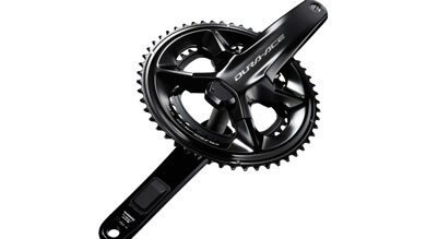 Plato negro de bicicleta con la palabra Dura-Ace escrita.