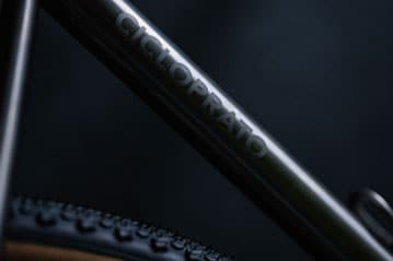 Cicloprato bicycle frame close-up with tire in background