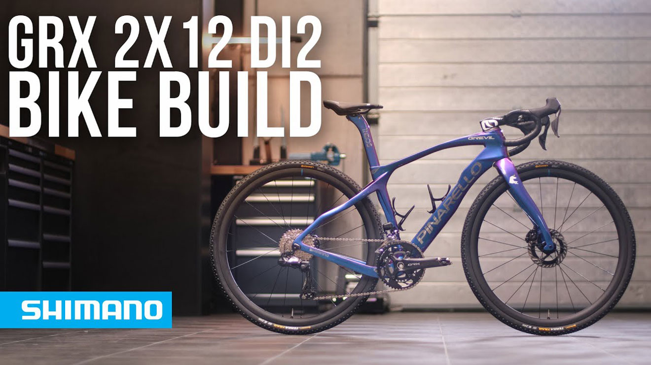 Shimano GRX 2x12 Di2 Bike Build with a blue Pinarello bike in a workshop