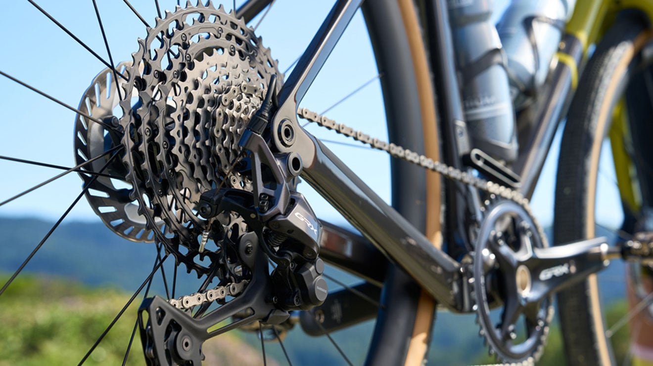 Close-up of a bicycle's rear derailleur and cassette