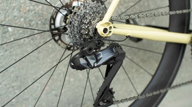 Close-up of a bicycle's rear derailleur and cassette