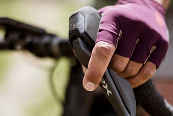 Close-up of a GRX bike handlebar with blurred background