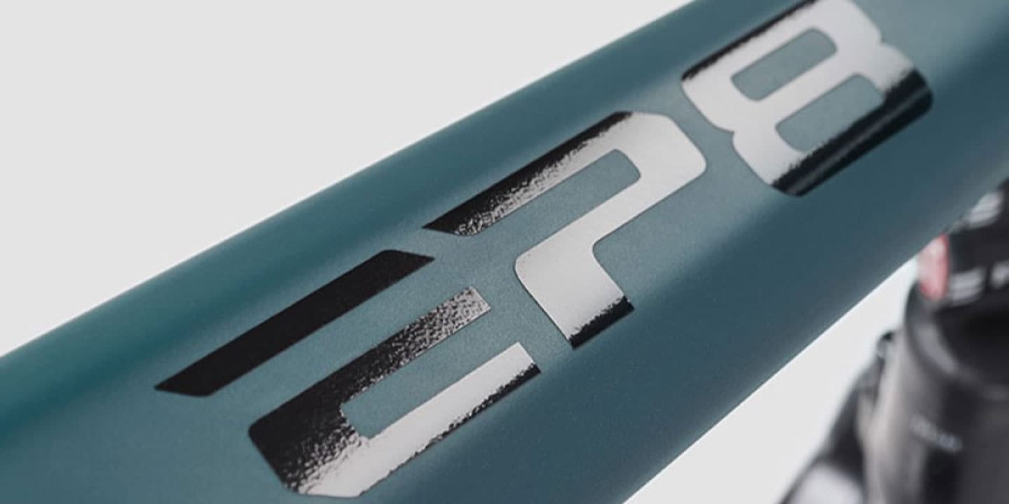 Close-up of a bicycle frame with the logo 'EP8' on it