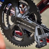 Close-up of a Dura-Ace bicycle crankset and pedals