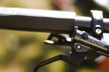 Close-up of a bicycle handlebar and brake lever