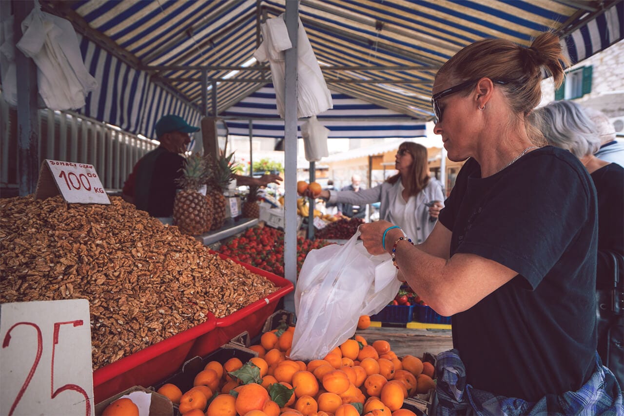Elladee Brown at local market in Croatia 