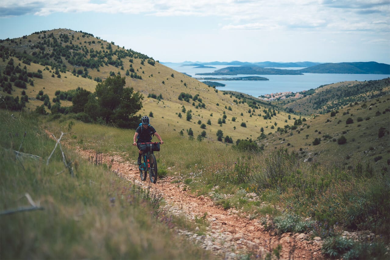 Elladee Brown bike packing on a mountain bike in Croatia 